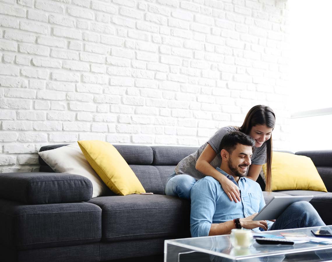 Couple Checking Out HVAC Maintenance Plan