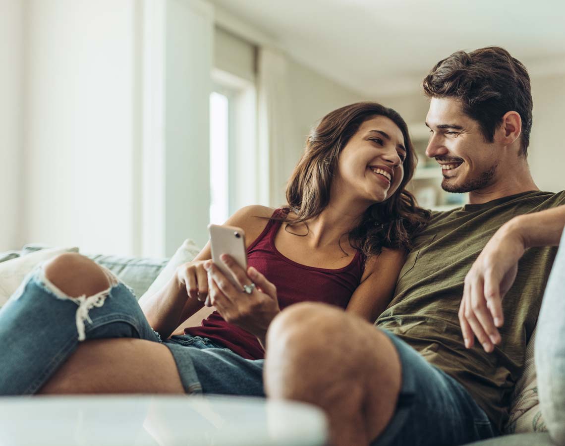 Couple Checking Out HVAC Deals